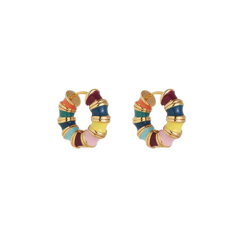 Rainbow Hoop Earrings in 18k gold plating featuring a vibrant array of enamel colors presented on a clear background.