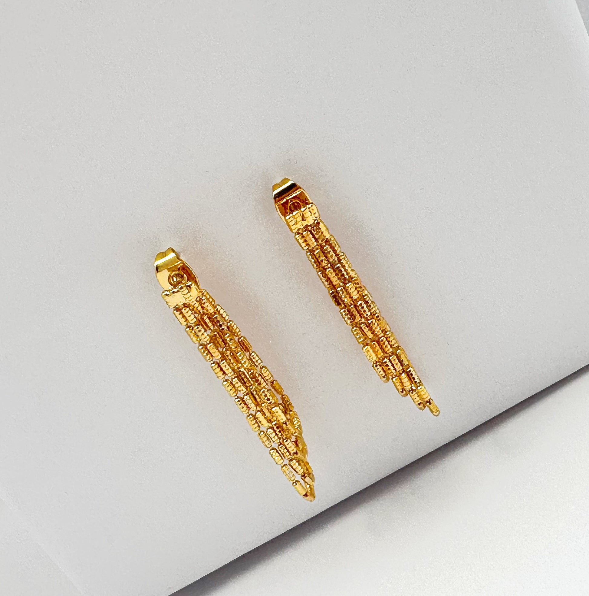 18k gold plated brass tassel earrings with intricate design