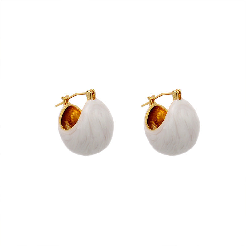 Modern 18k gold-plated earrings with a lustrous white glaze detail