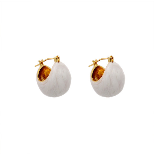 Modern 18k gold-plated earrings with a lustrous white glaze detail