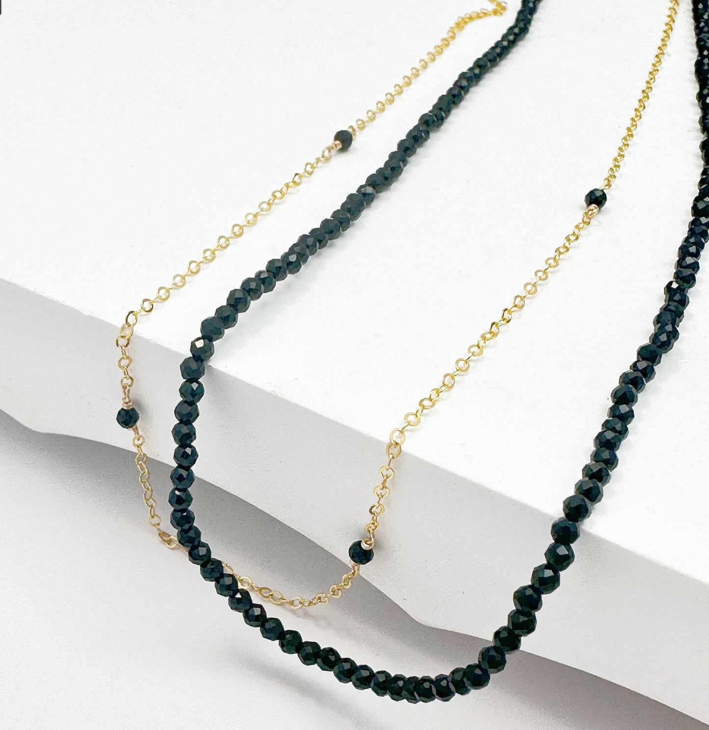 Double layered gold filled choker with black spinel beads.