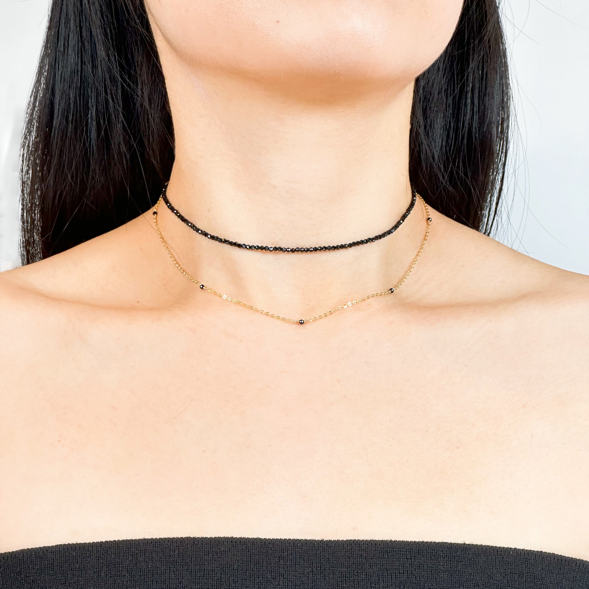 Double layered gold filled choker with black spinel beads.