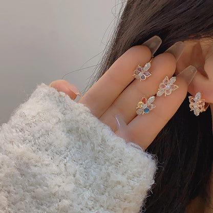 Elegant Dancing Butterfly Earrings with multi-colored zircon stones and 18k gold plating, offering a vibrant touch to both casual and formal attire.