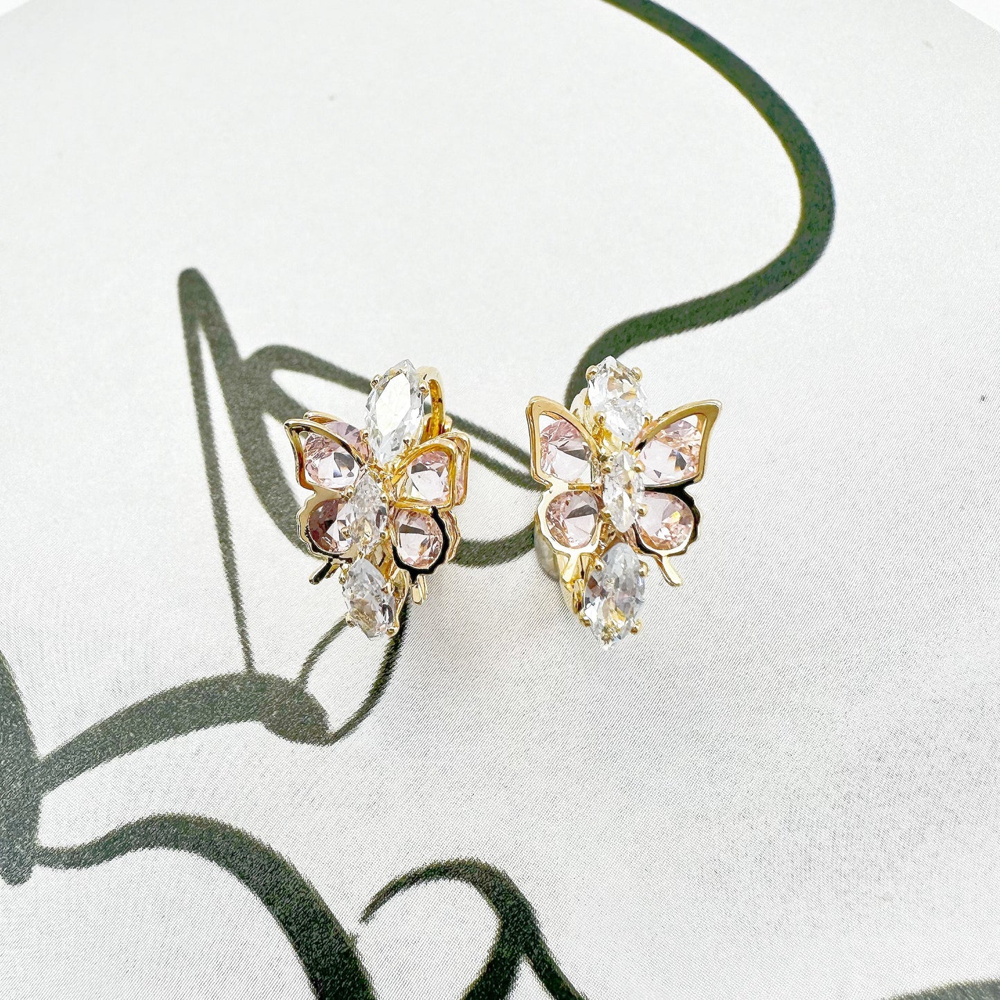 Elegant Dancing Butterfly Earrings with multi-colored zircon stones and 18k gold plating, offering a vibrant touch to both casual and formal attire.