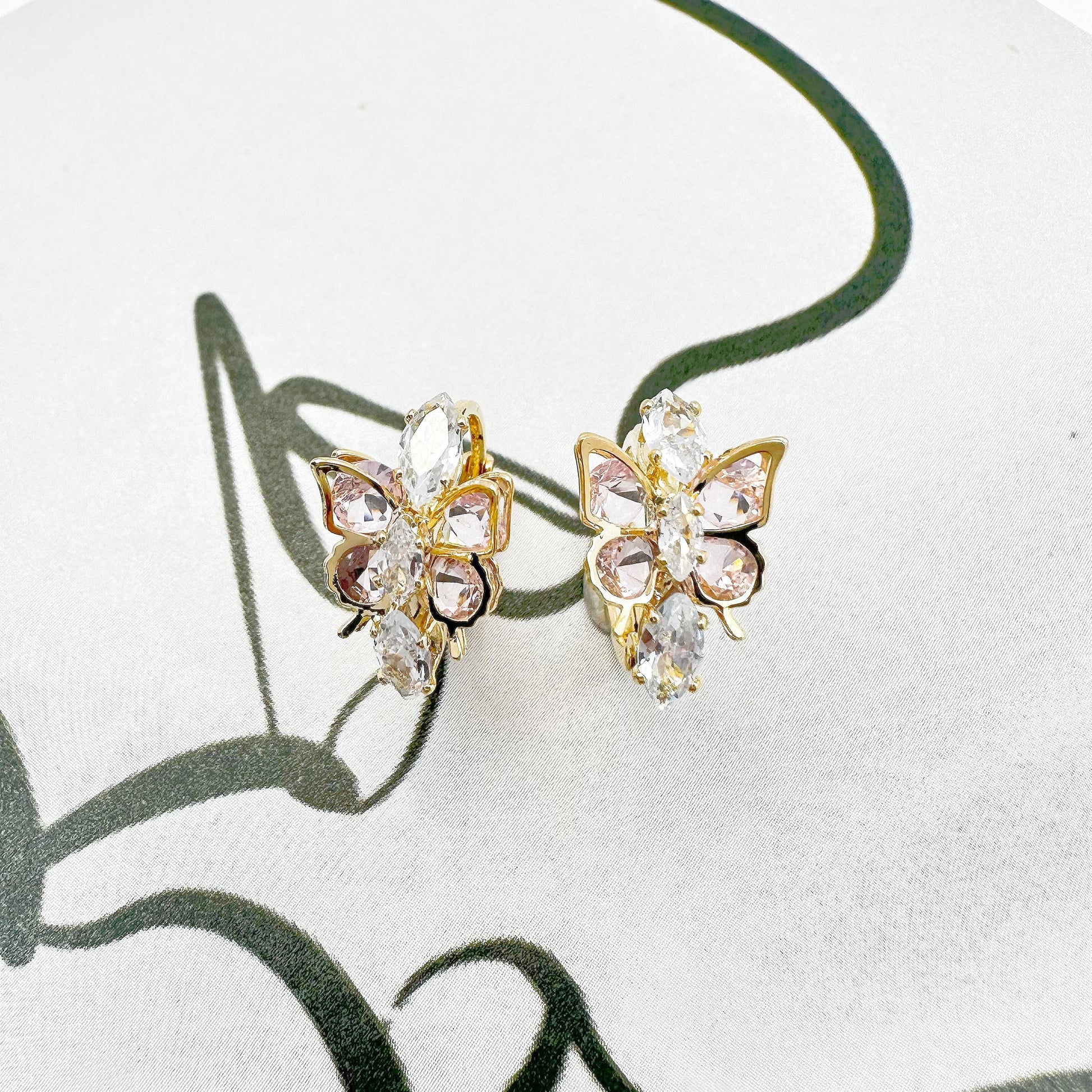 Elegant Dancing Butterfly Earrings with multi-colored zircon stones and 18k gold plating, offering a vibrant touch to both casual and formal attire.