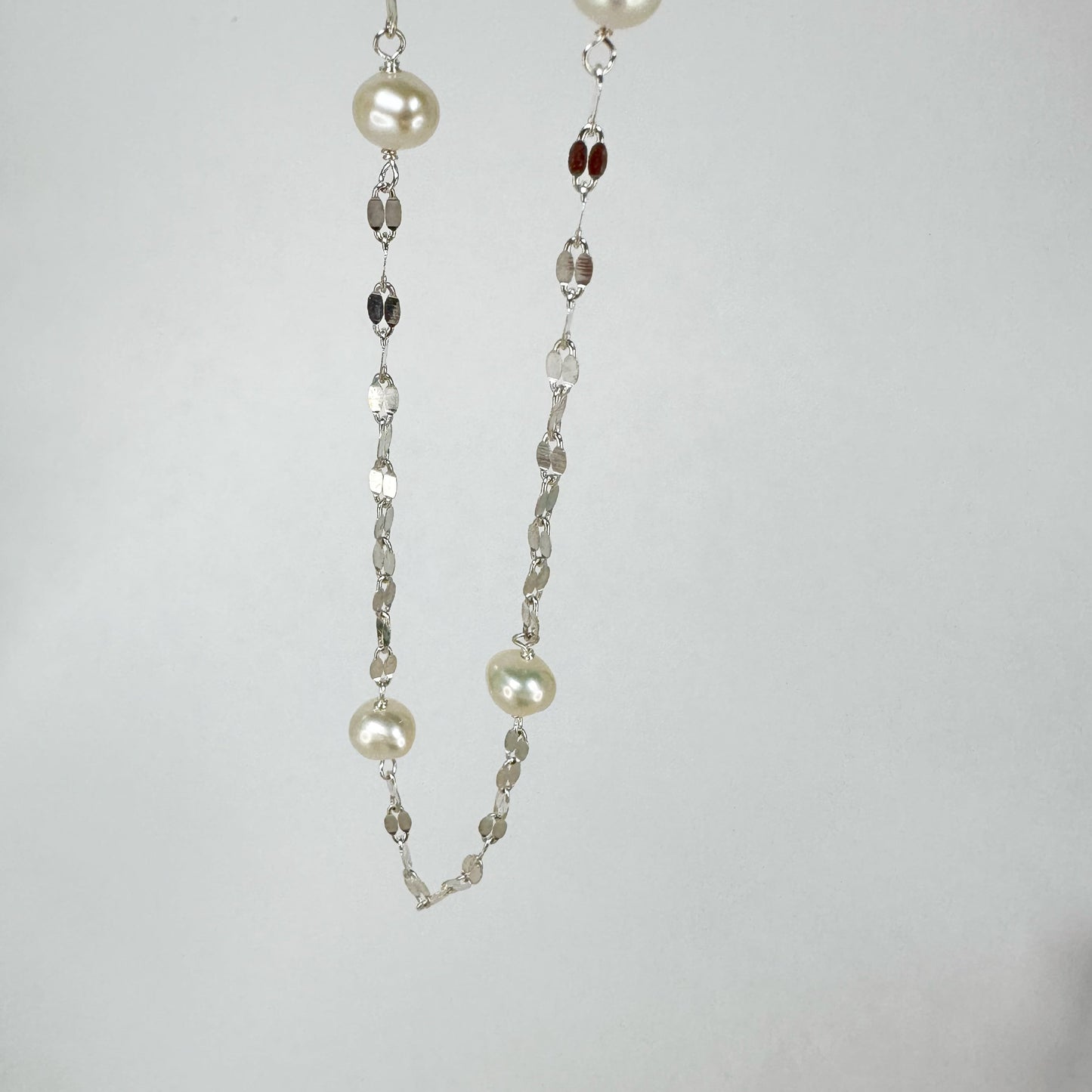 Exquisite Glacier Necklace with Akoya Baroque pearls interlinked with shimmering S925 sterling silver chain for an elegant adornment