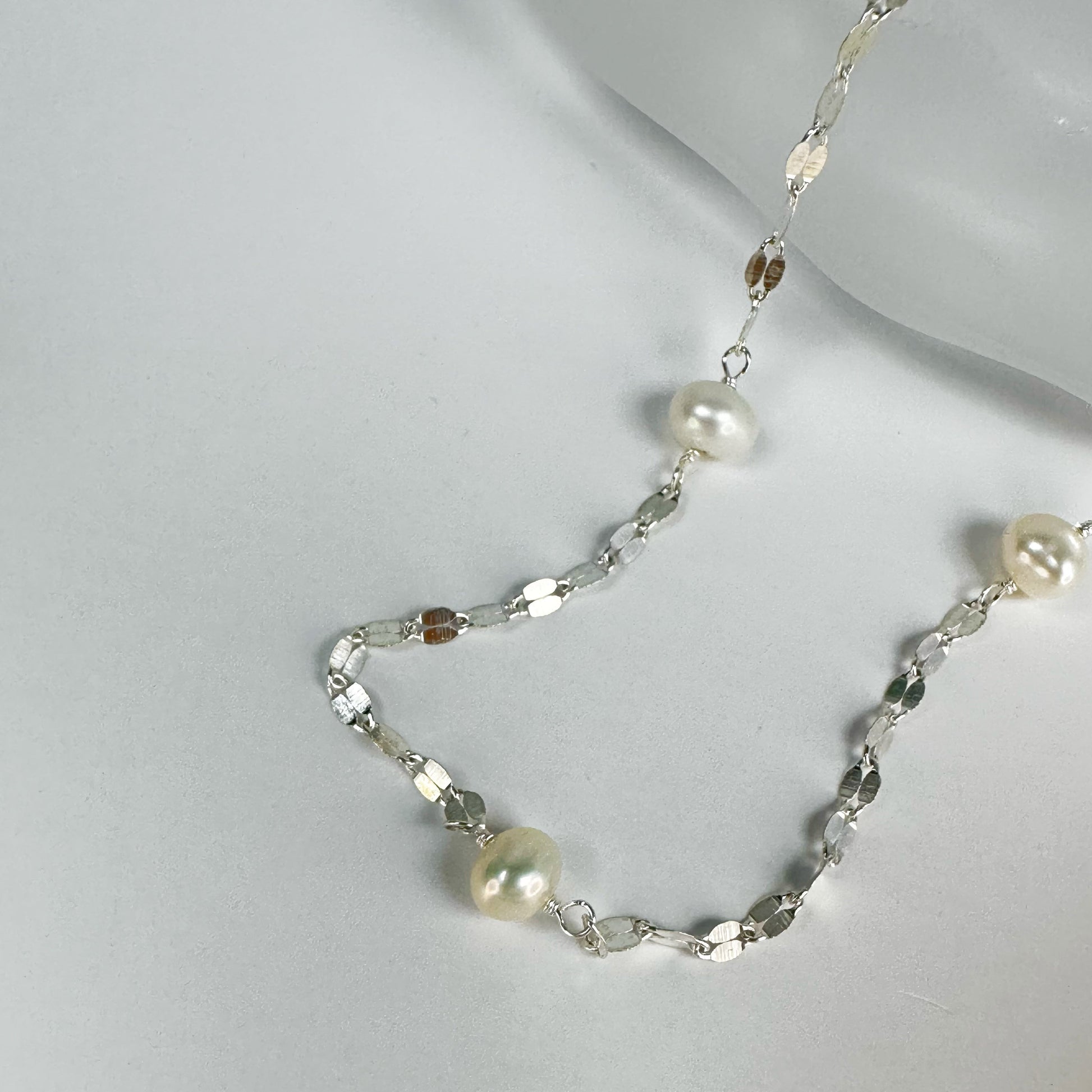 Exquisite Glacier Necklace with Akoya Baroque pearls interlinked with shimmering S925 sterling silver chain for an elegant adornment