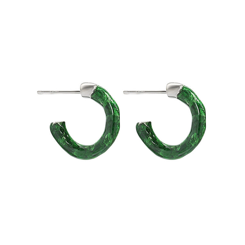 Curved hoop earrings made of S925 sterling silver with a vibrant green coating